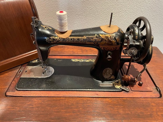 Image 1 of Singer treadle sewing machine furniture