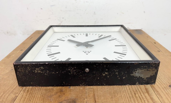Image 1 of Zwarte industriële vierkante wandklok van Pragotron, jaren 70