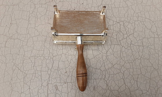 Image 1 of Recogemigas plateado , F.B. Rogers , 1960