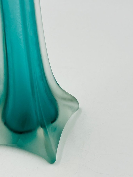 Image 1 of Murano-style turquoise glass bud vase in the shape of the Eiffel Tower