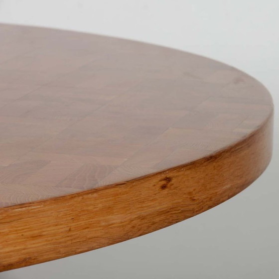 Image 1 of Round wooden standing dining table dating from the 1980s