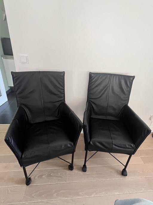 2 Montis Chaplin eetkamerstoelen met wielen. 
