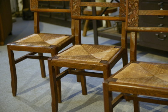 Image 1 of Set van 6 eikenhouten stoelen in de stijl van Pierre Cruège, jaren 1940.