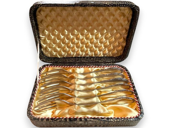 Image 1 of Antieke Duitse taartvorken van Wellner, daterend uit het begin van de 20e eeuw (ca. 1910-1930), in originele kist.