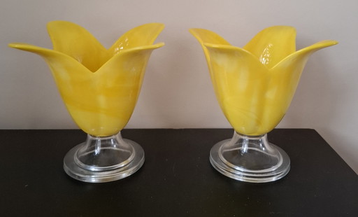 2 tulip-shaped glass candlesticks