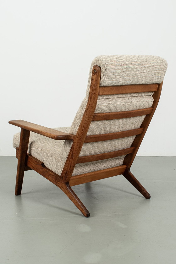 Image 1 of Hans Wegner GE 290 fauteuil met voetenbank