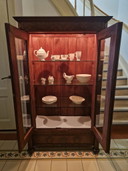 Classic wooden display cabinet or china cabinet.