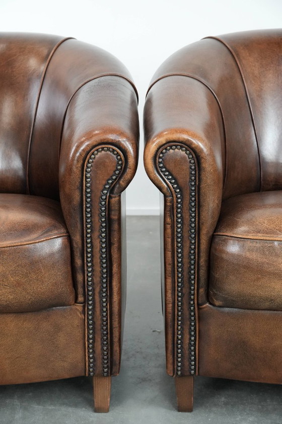 Image 1 of 2 poltrone da club in pelle di pecora con cuscino di seduta fisso e bellissimi colori