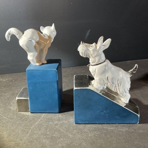 Fermacarte Art Déco Asimmetrici in Cromo Bianco Blu & Ceramica, Anni '30, Set di 2 – Oggetti decorativi (photo 11 of 17)