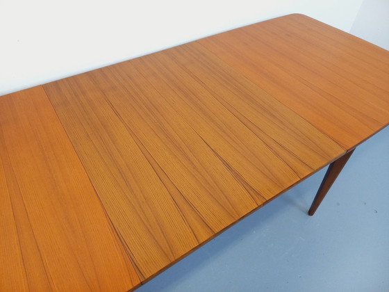 Image 1 of Rectangular Scandinavian-style vintage dining table from the 1950s/60s in teak with extensions