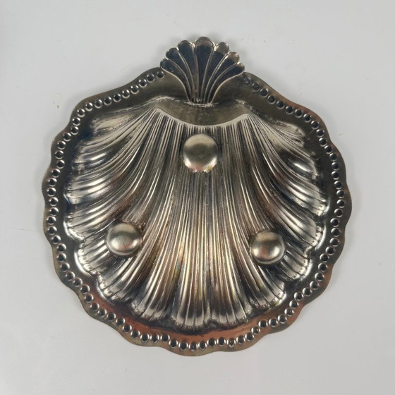 Image 1 of Trinket dish / Open butter dish in silver-colored metal with a seashell shape and blue glass insert, 1970