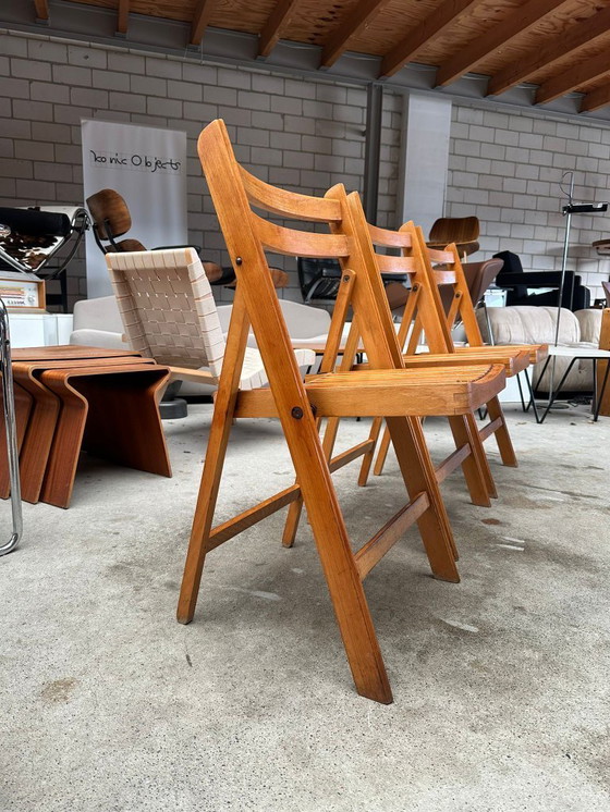 Image 1 of Chaises pliantes vintage en bois (plusieurs disponibles)