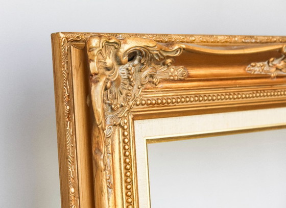 Image 1 of Antique Baroque wooden frame, patinated with gold leaf, handmade, Louis XVI style. Baroque frame for a painting, mirror, etc.