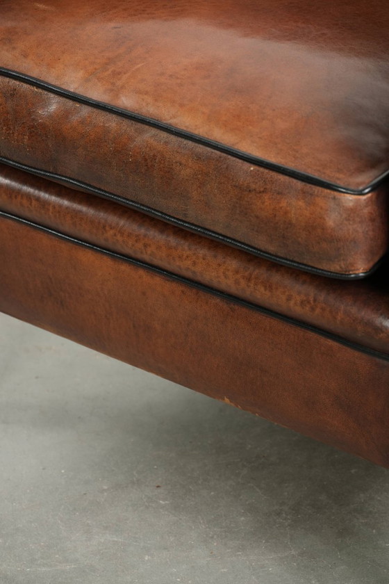 Image 1 of Strakke schapenleren Art Deco design armchair/ fauteuil met zwarte biezen en een prachtige warme kleur