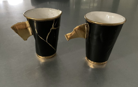 Image 1 of 2x rare "crease cups" black and gold