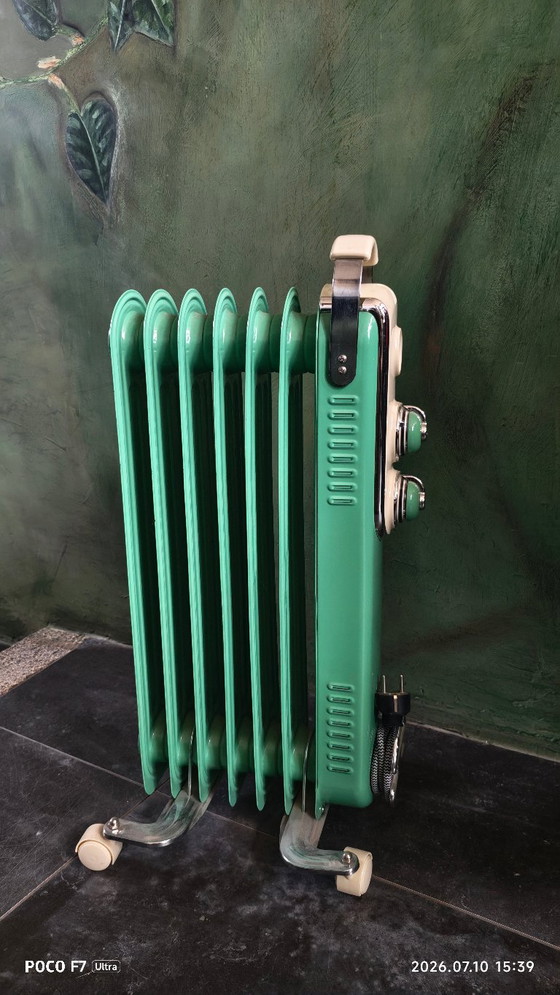 Riscaldatore elettrico vintage a olio – Prodotti per la manutenzione, polished steel (photo 2 of 5)