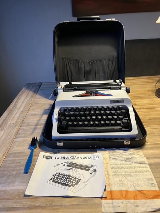 Vintage portable Erika typewriter in a suitcase