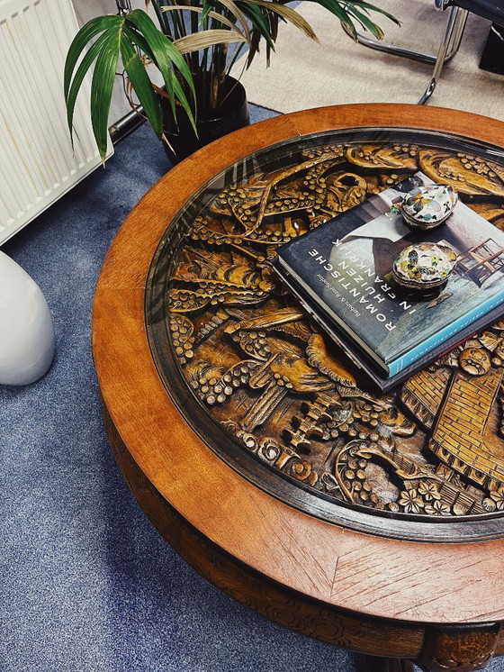 Image 1 of Round Wooden Coffee Table with Asian Carved Top