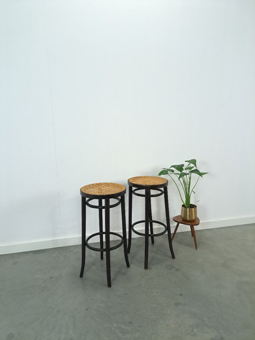Set of 1950s wooden bar stools with webbing from France