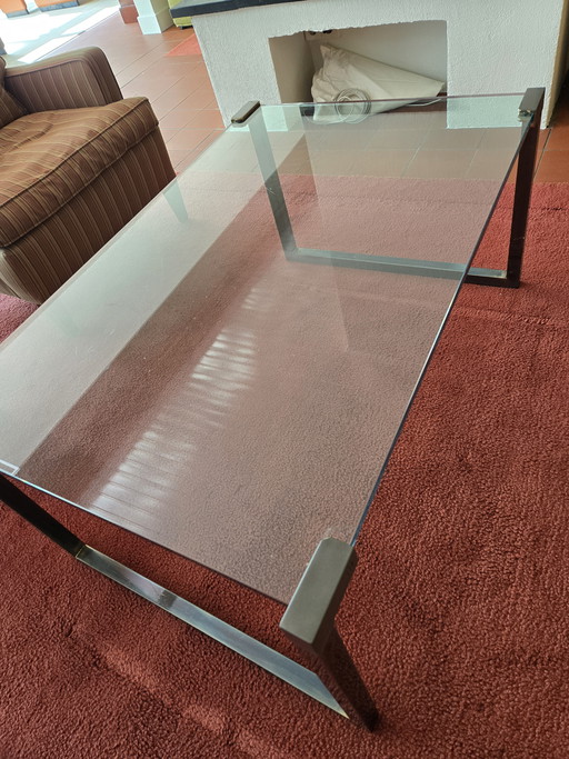 Coffee table made of sturdy glass and a designer metal frame