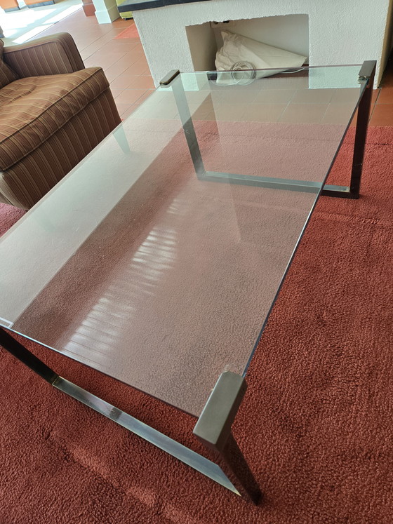 Image 1 of Coffee table made of sturdy glass and a designer metal frame