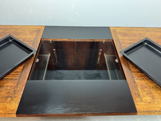 Image 1 of Iconic Mid-Century Sliding Bar Coffee Table in Solid Rosewood with Concealed Bar Compartments by E. Pedersen, Denmark 1960s.