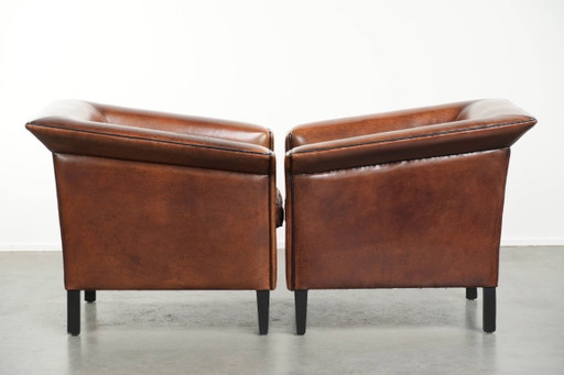 2 poltrone/poltrone lounge in elegante pelle di pecora dal design Art Déco con profili neri