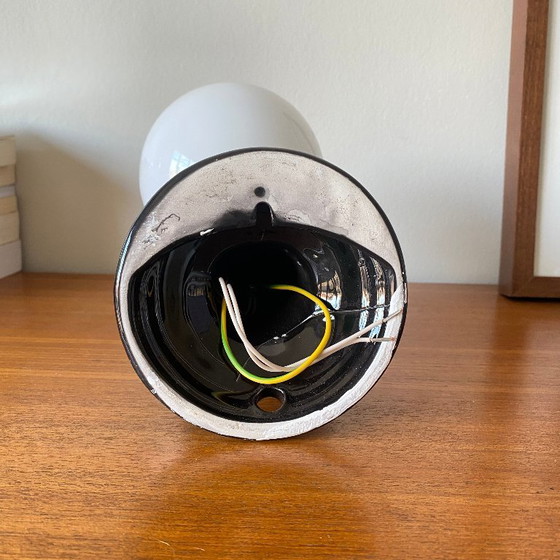 Image 1 of Pair of black ceramic hand-shaped wall sconces from the 70s and 80s