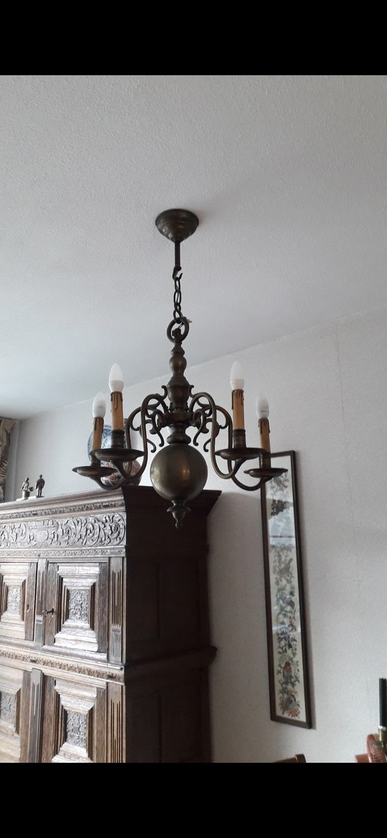 Image 1 of Pesante corona antica in bronzo.