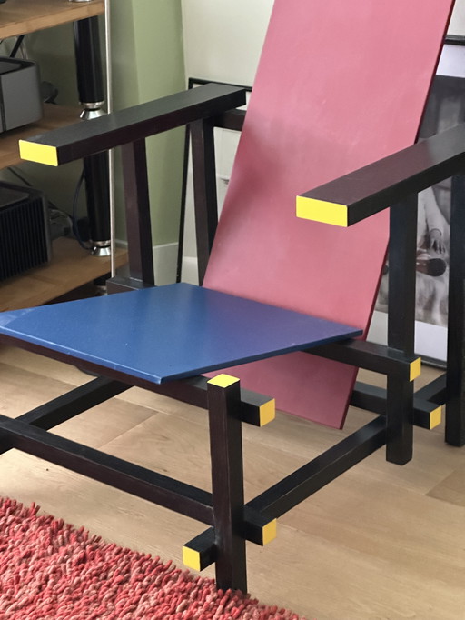 Red blue wooden chair