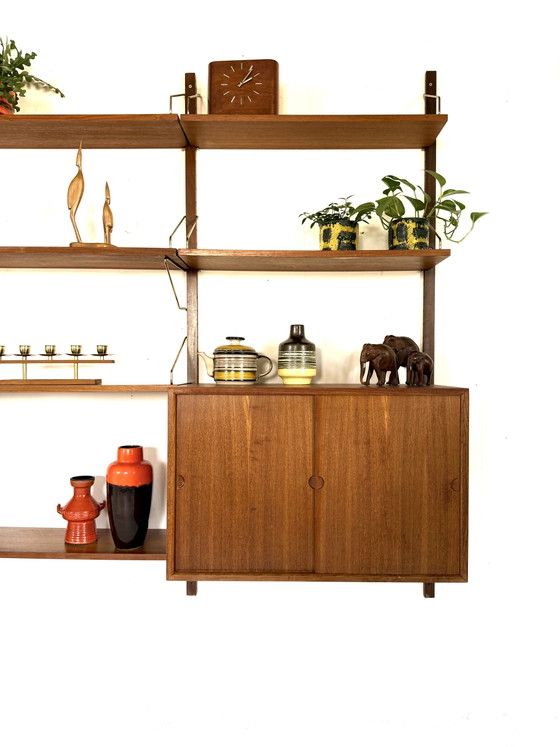 Vintage modulair teakhouten wandsysteem, Poul Cadovius ‘60 – Wandkast, Wood, Brass (photo 4 of 15)