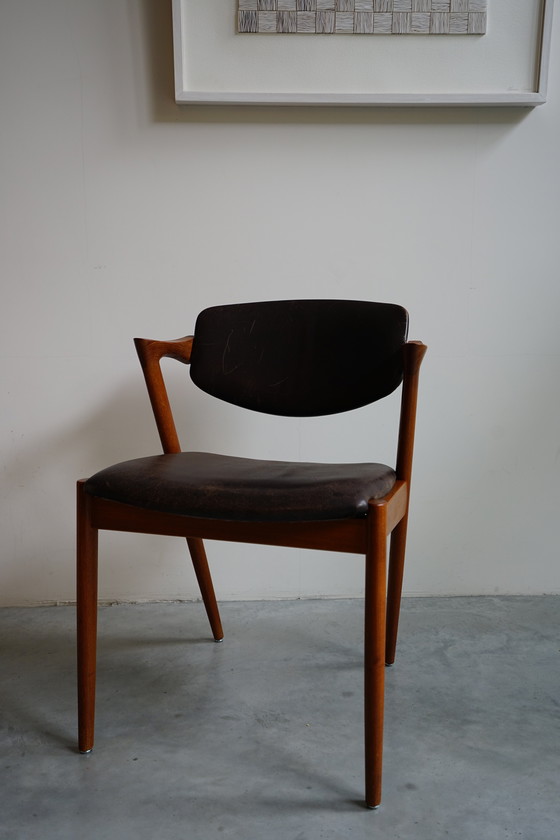 Image 1 of 6 Kai Kristiansen stoelen | Model 42 | Teak Leder patina