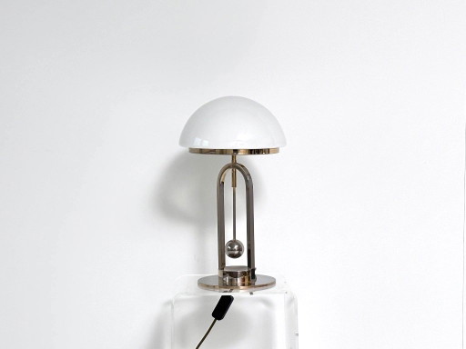Art Deco Table lamp with white opal glass and decorative pendulum
