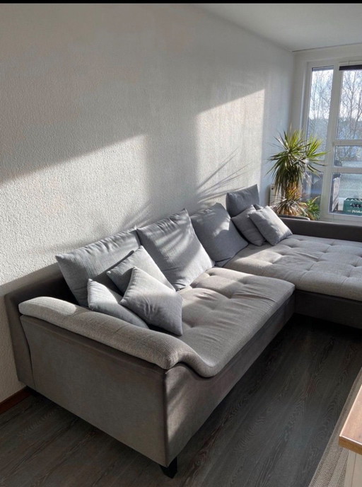 Gran conjunto de sala de estar / sofá en forma de L con cojines incluidos