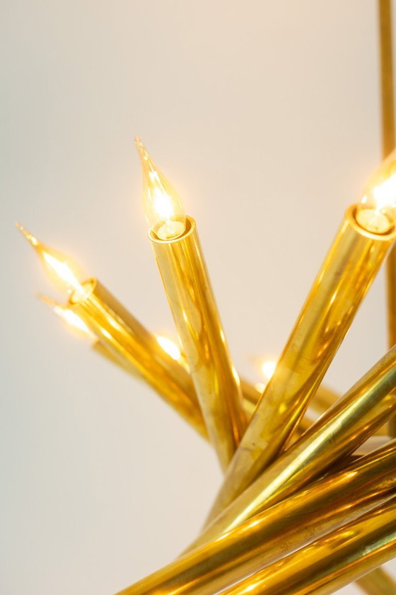 Image 1 of Pair of 24-light chandeliers in patinated brass. 1980s.