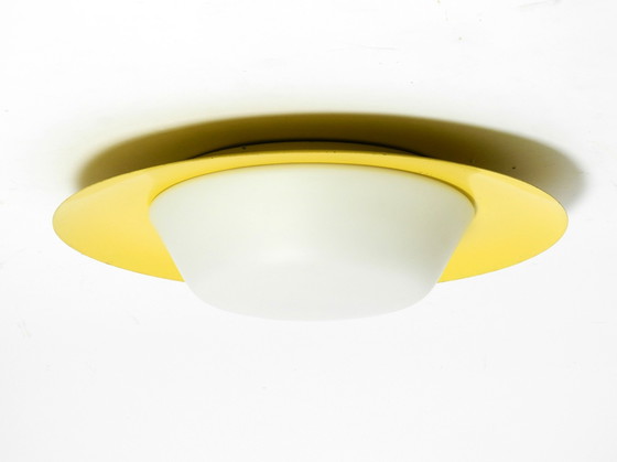 Image 1 of Large Mid-Century Wall or Ceiling Lamp Made of Glass with Metal Reflector in Yellow from Kaiser Leuchten
