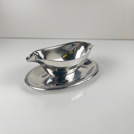 Image 1 of Silver-colored Empire-style metal gravy boat