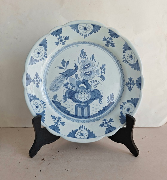 Image 1 of Firma Oud Delft Nijmegen 4 antike, zinnglasierte, handbemalte Pfauenteller aus Delfter Blau.