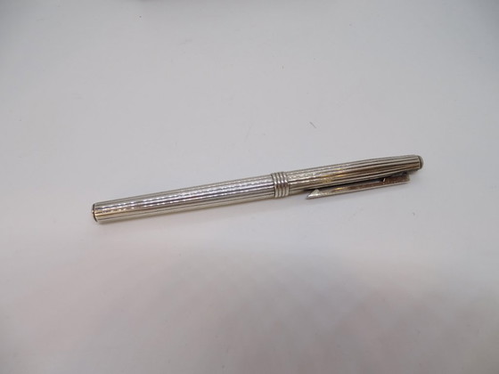 Image 1 of Penna a sfera scanalata Dior, metallo argentato, anni '70 - Francia