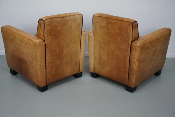 Image 1 of Vintage Nederlandse clubfauteuils van cognackleurig leer, set van 2