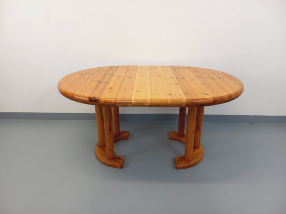 Image 1 of Vintage Scandinavian round dining table by Rainer Daumiller in pine from the 1960s/70s with extensions