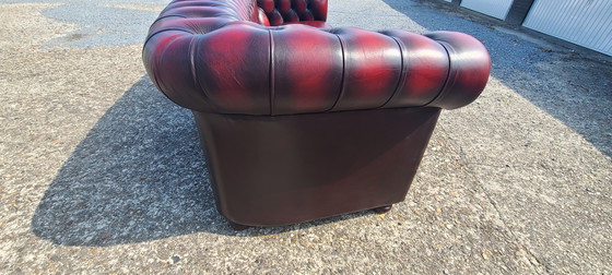 Image 1 of Original Springvale Chesterfield 3 seater sofa in oxblood red