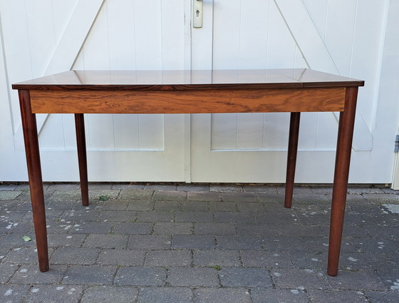 Image 1 of Mesa de comedor de diseño danés en madera de palisandro.