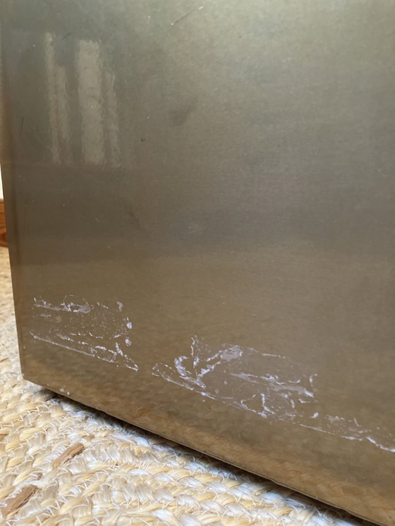 Image 1 of Electro-galvanized metal seat, brass effect. Pharrell Williams / Louis Vuitton fashion show, 2024