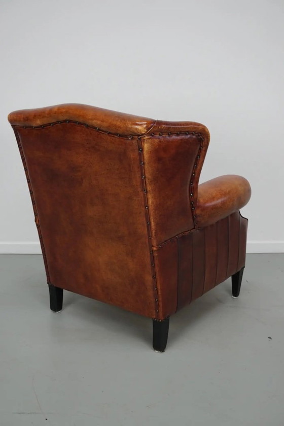 Image 1 of Vintage Nederlandse clubfauteuil in cognackleurig leer