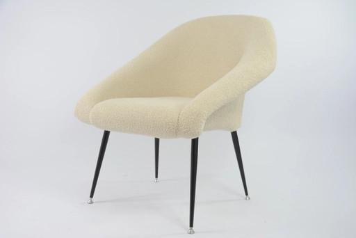 Beige bouclé kuipstoel