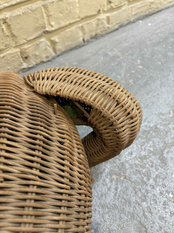 Image 1 of Vintage rattan newspaper rack with frog motif