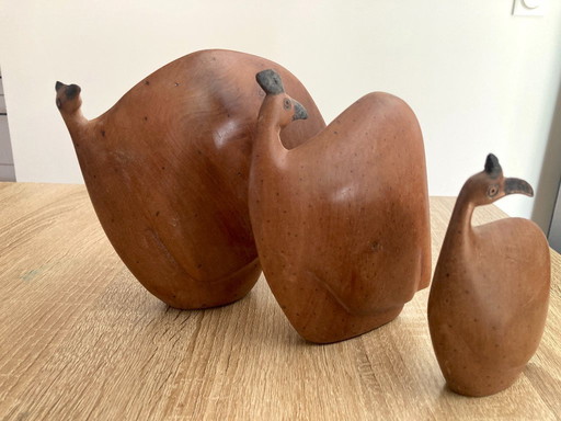 Set of 3 minimalist solid wood bird figurines from Africa