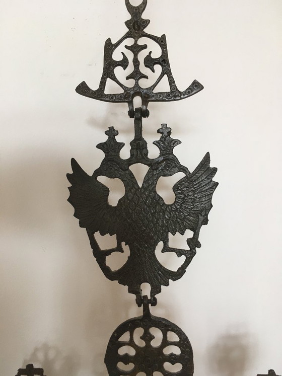 Image 1 of Aplique de pared con cruz bizantina en bronce.