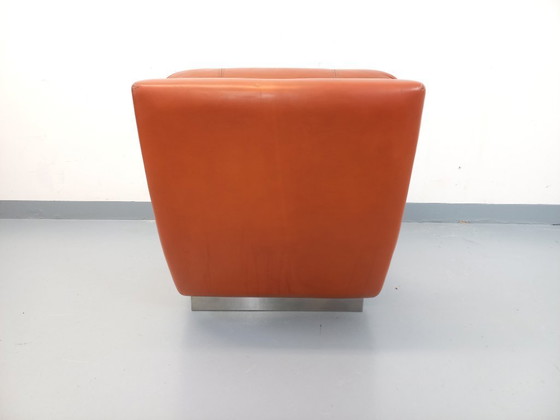 Image 1 of Vintage Roche Bobois-fauteuil in chroom en tegelkleurig leer uit de jaren 70.